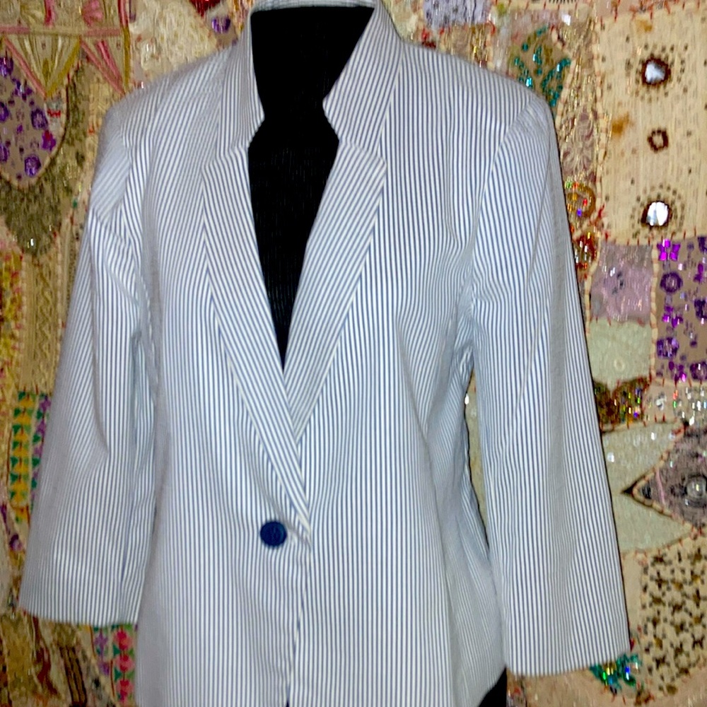 54% Cotton 41% Polyester 5% Spandex single button blue & white pinned stripes